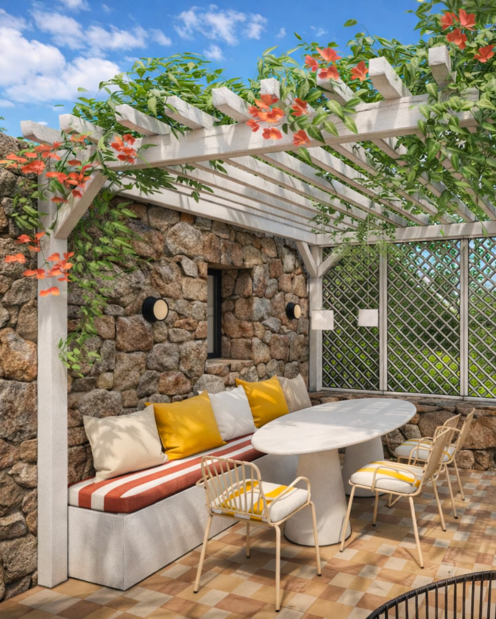 Terrasse extérieur avec aménagement sur mesure, sol travaillé et mobilier extérieur, dans une bergerie rénovée.